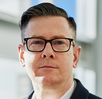 Alexander Hughes, CEO da empresa de trading de criptomoedas, retrato